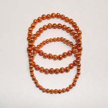 Load image into Gallery viewer, Hand Wrought Ribbed Copper Bead Bracelets - Stack of 3
